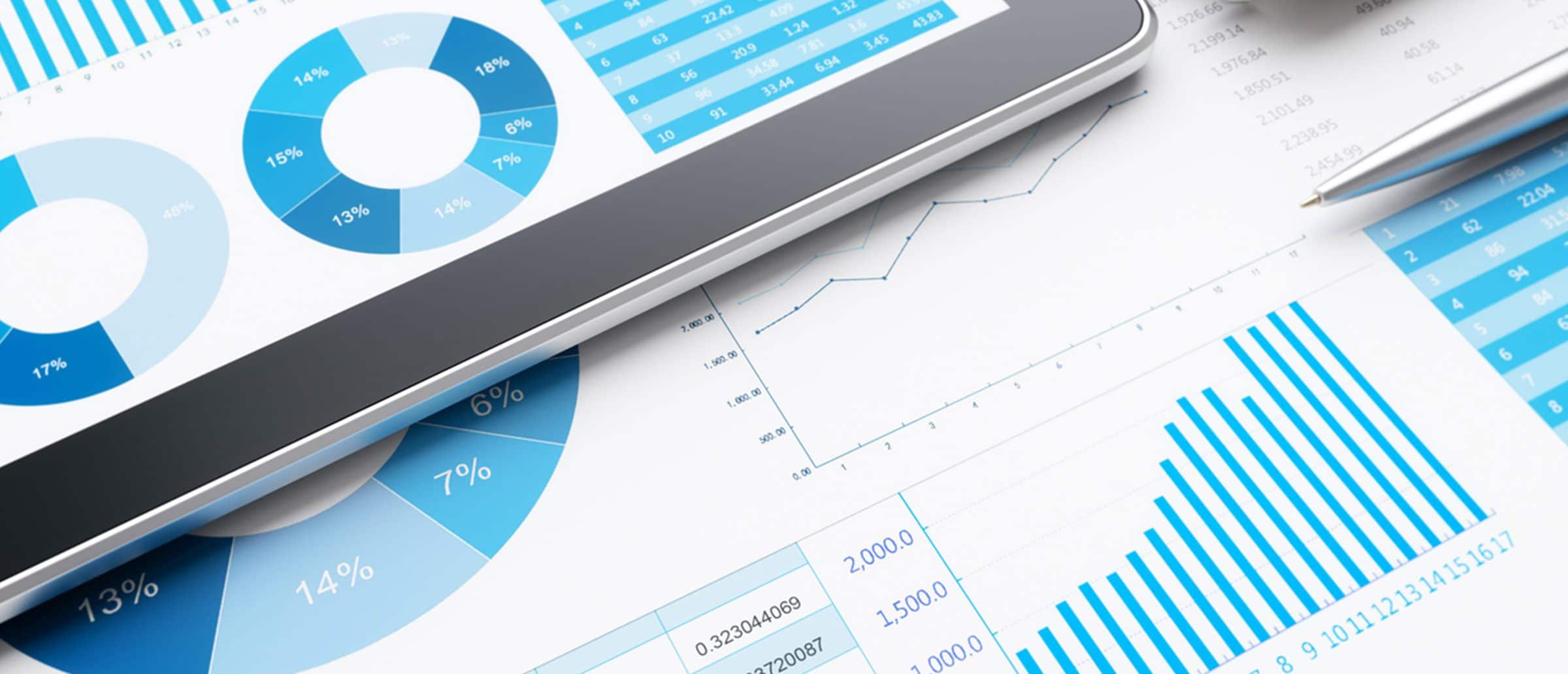 Data collage of blue pie charts, bar graphs, percentages, line connected dots